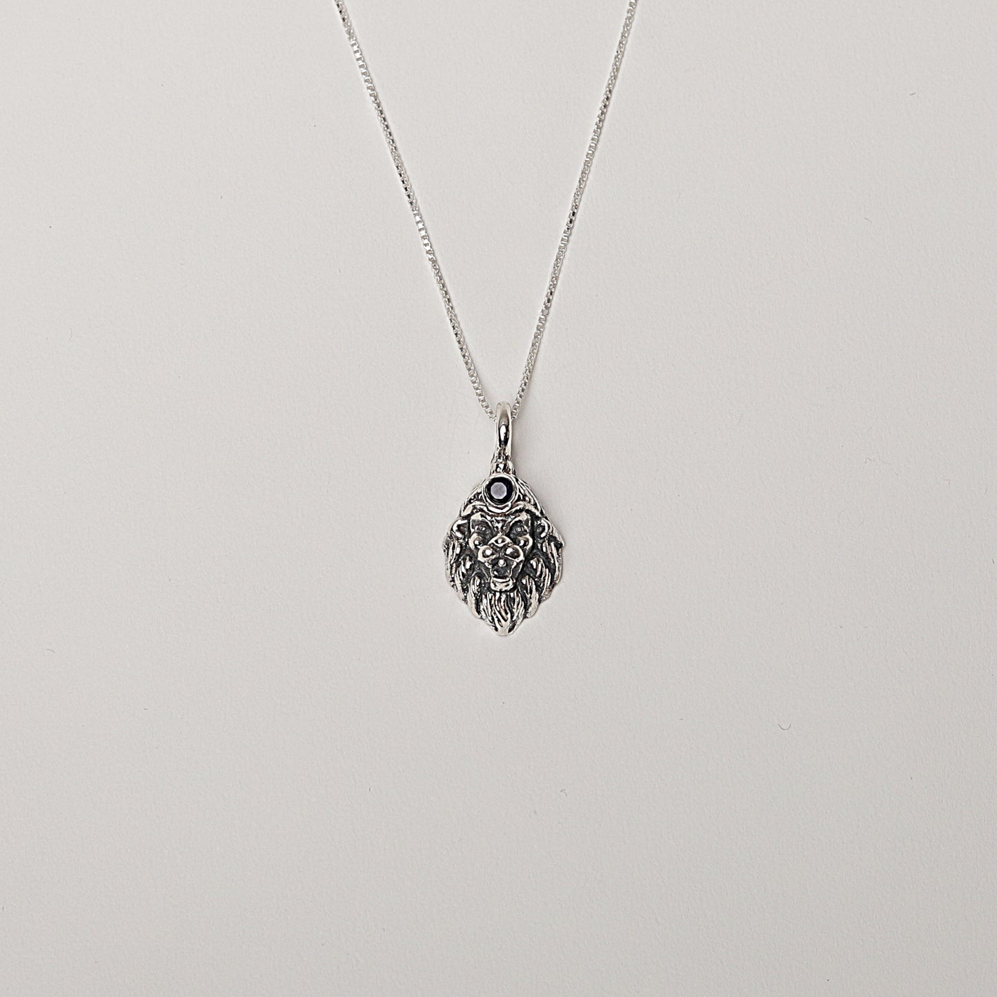 Silver Lord Narasimha Pendant with Blue Lolite