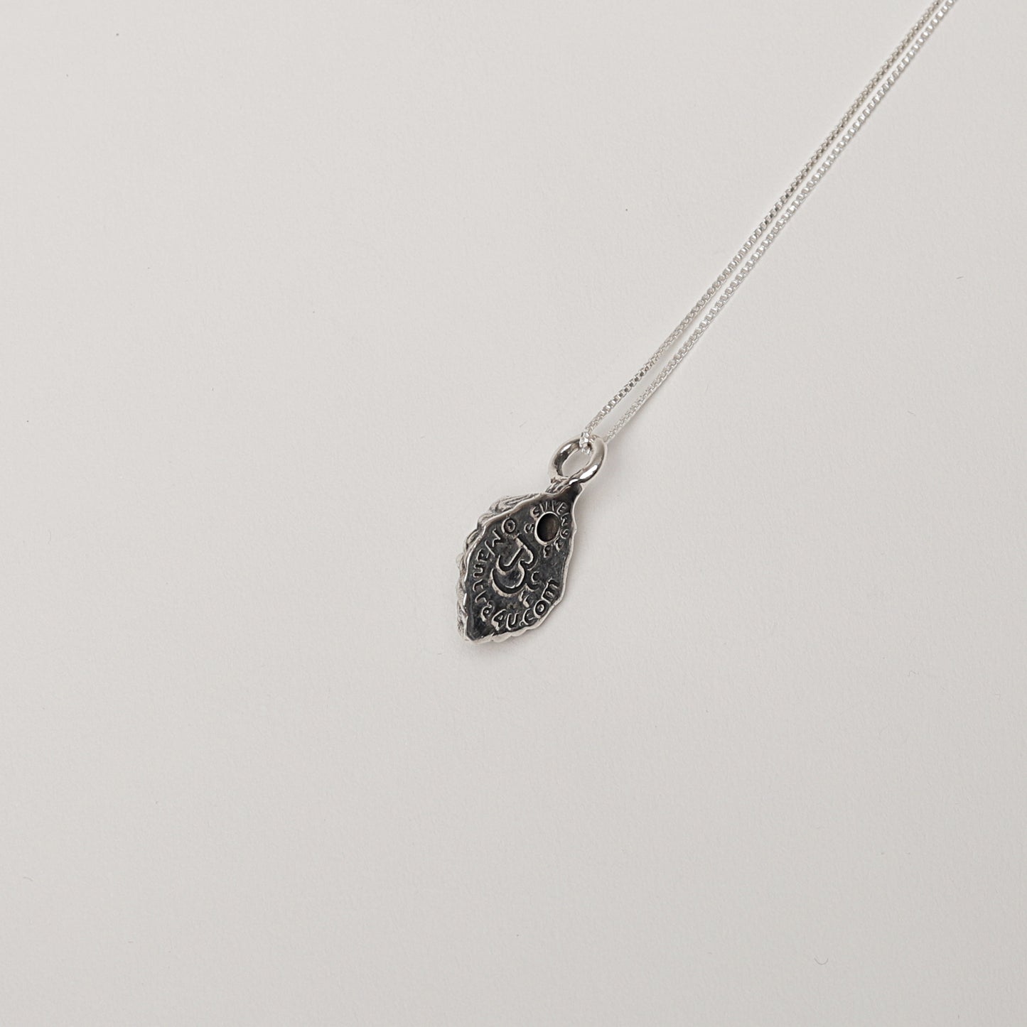 Silver Lord Narasimha Pendant with Blue Lolite